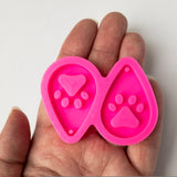 Paw Print Teardrop Shaped Silicone Mold, Held In Hand
