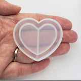 Small Heart Shaker Silicone Mold, Held In Hand