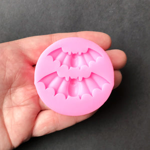 Two Bats Silicone Mold For Resin, Held In Hand