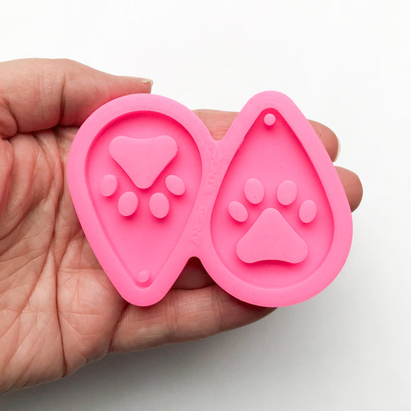 Medium Teardrop Paw Print Silicone Mold For Resin, Held In Hand