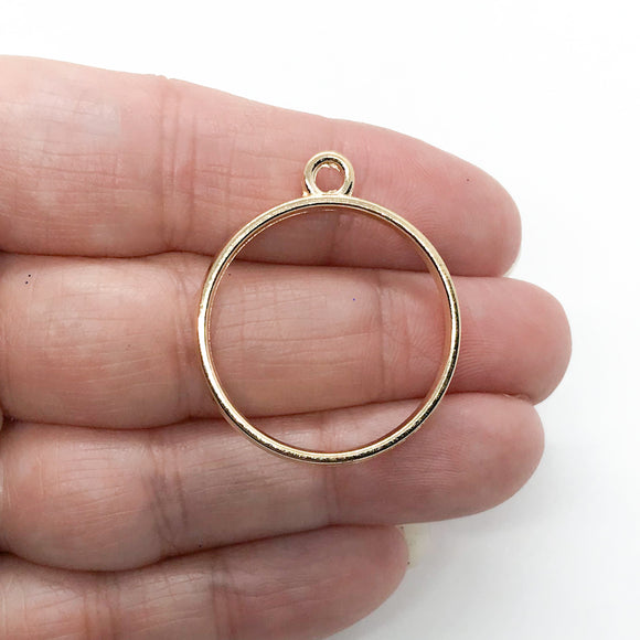 2mm Thick Round Gold Tone Open Bezel, Held In Hand
